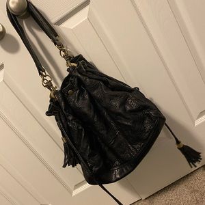 Black drawstring hobo bag